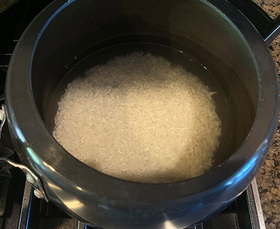 rice in a pressure cooker with water