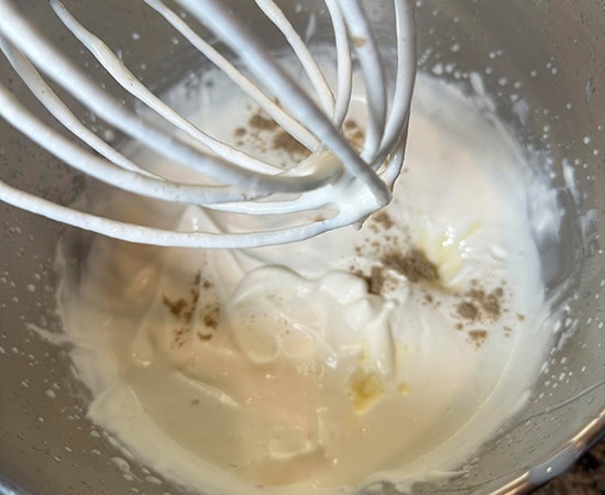 flavoring being added to whipping cream
