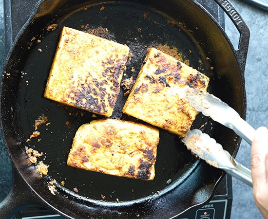 grilled paneer slabs on a pan