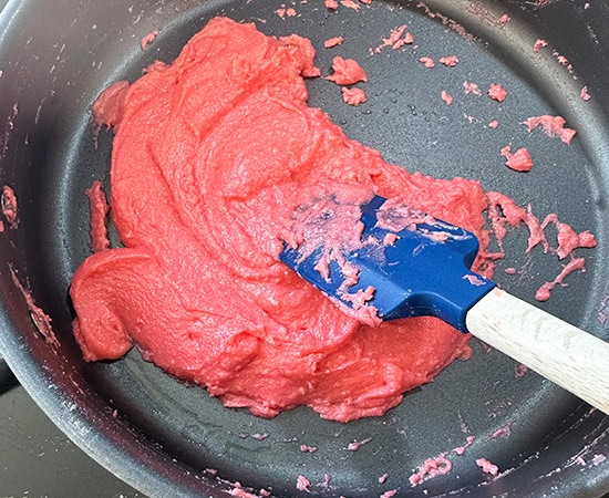 pink dough in a pan