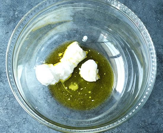 yogurt with olive oil in a glass bowl